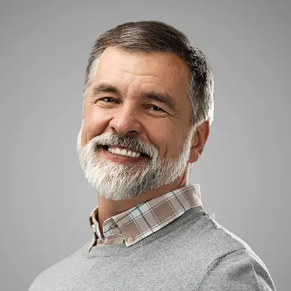 Handsome senior smiling with his Same Day Smile