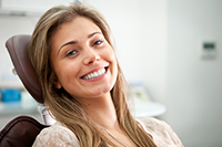 Young Woman smiling after wisdom tooth removal by Mountain State Oral and Facial Surgery in Hurricane, WV Young Woman smiling after wisdom tooth removal by Mountain State Oral and Facial Surgery in Hurricane, WV