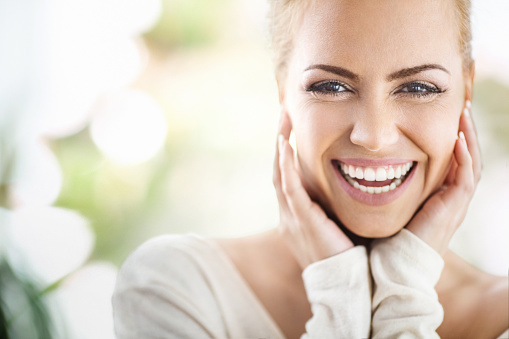 Womanwithwhiteteethsmiling GettyImages 690840724