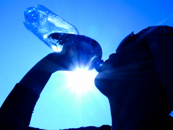 Thirsty person drinking water